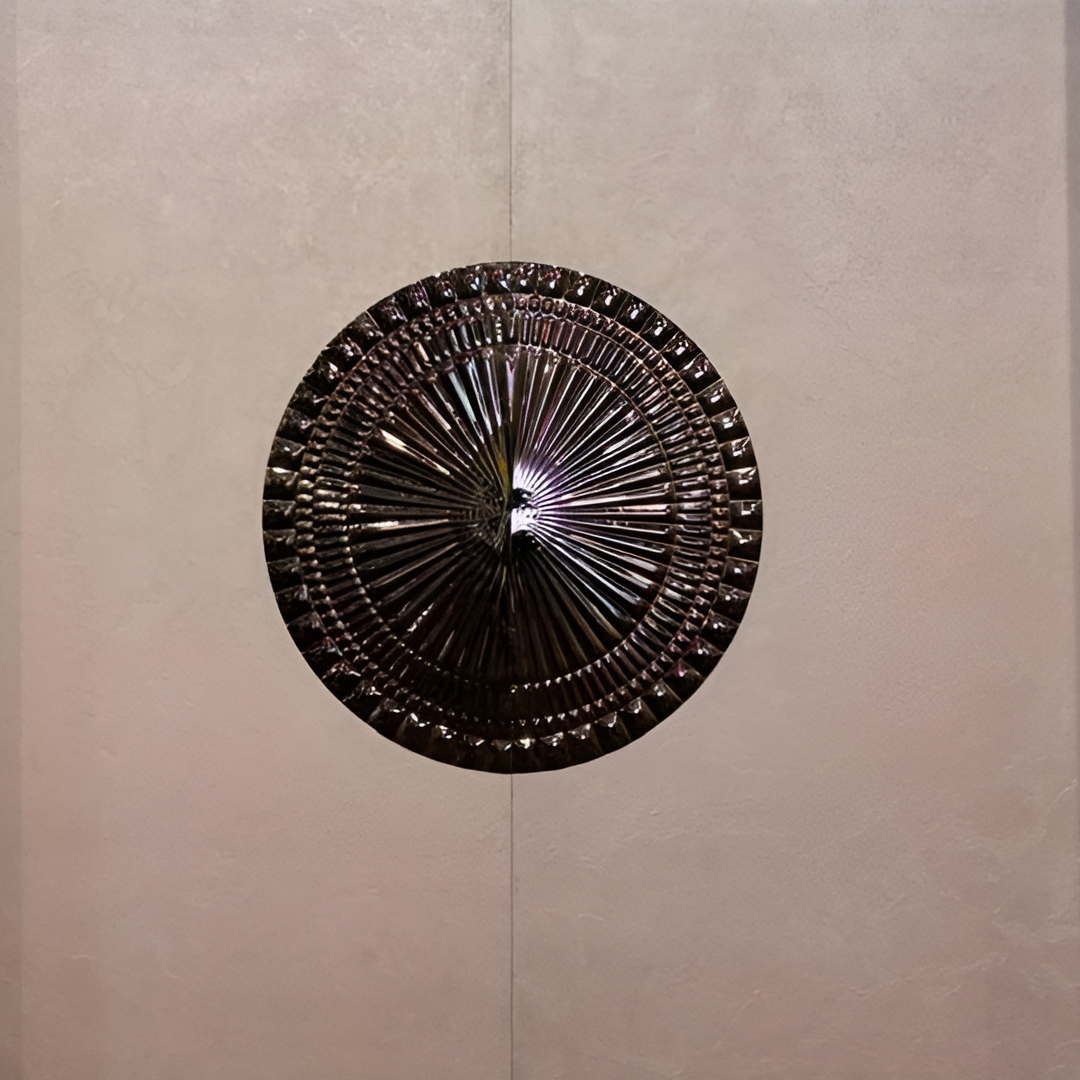 Premium fabric-backed stainless steel wall panel with classic sunburst medallion design and intricate radial patterns